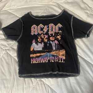 This is an AC/DC tight fitted shirt. It’s brand new and never been worn.